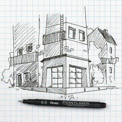 Sketch of a building on grid paper with a Pentel Pointliner pen below